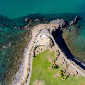 Aerial view of the Cap d'Agde sea resort on the South of France along the Mediterranean Sea - Rocky cape from above