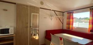 Stacaravan Standard 26m² 2 slaapkamers + terras (landzijde)